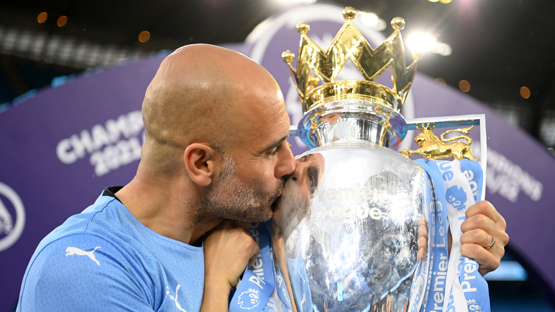 pep-guardiola-premier-league-trophy.jpg